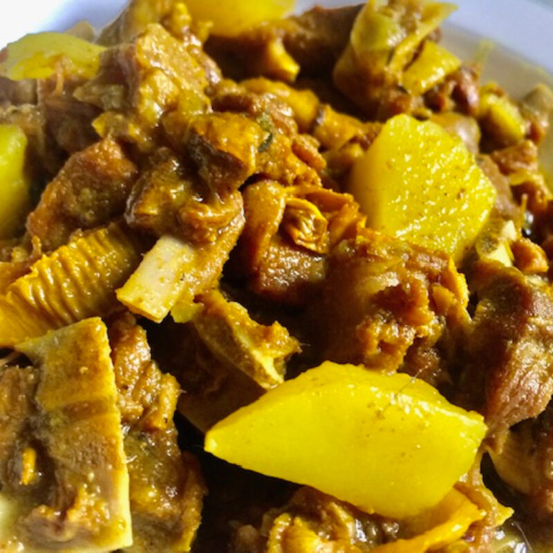 Curry goat plate